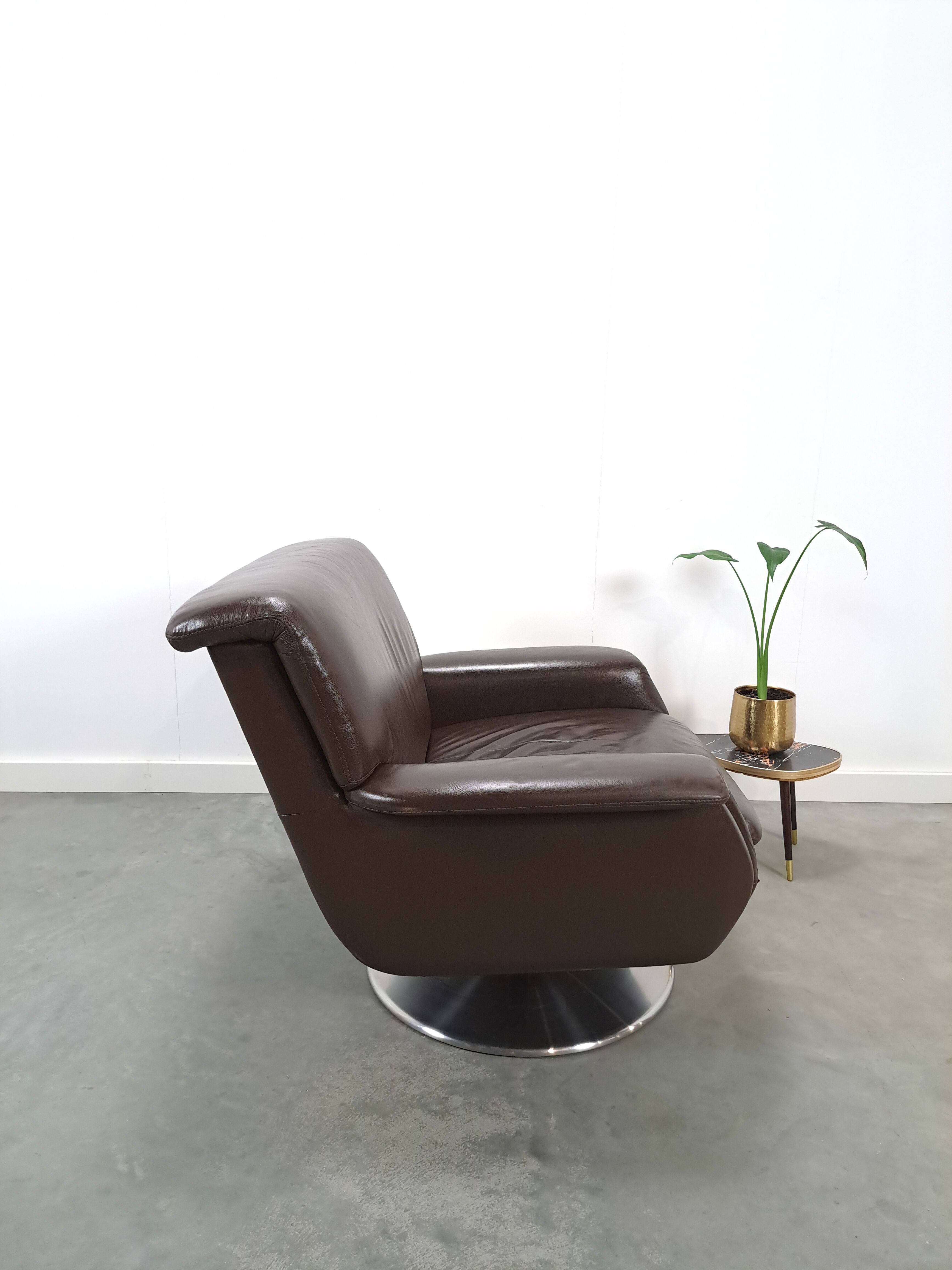 Brown leather swivel chair