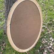 Bevelled golden oval mirror, 79 x 59 cm