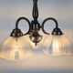 Antique Art Deco chandelier with 3 arms in patinated metal and ribbed glass.