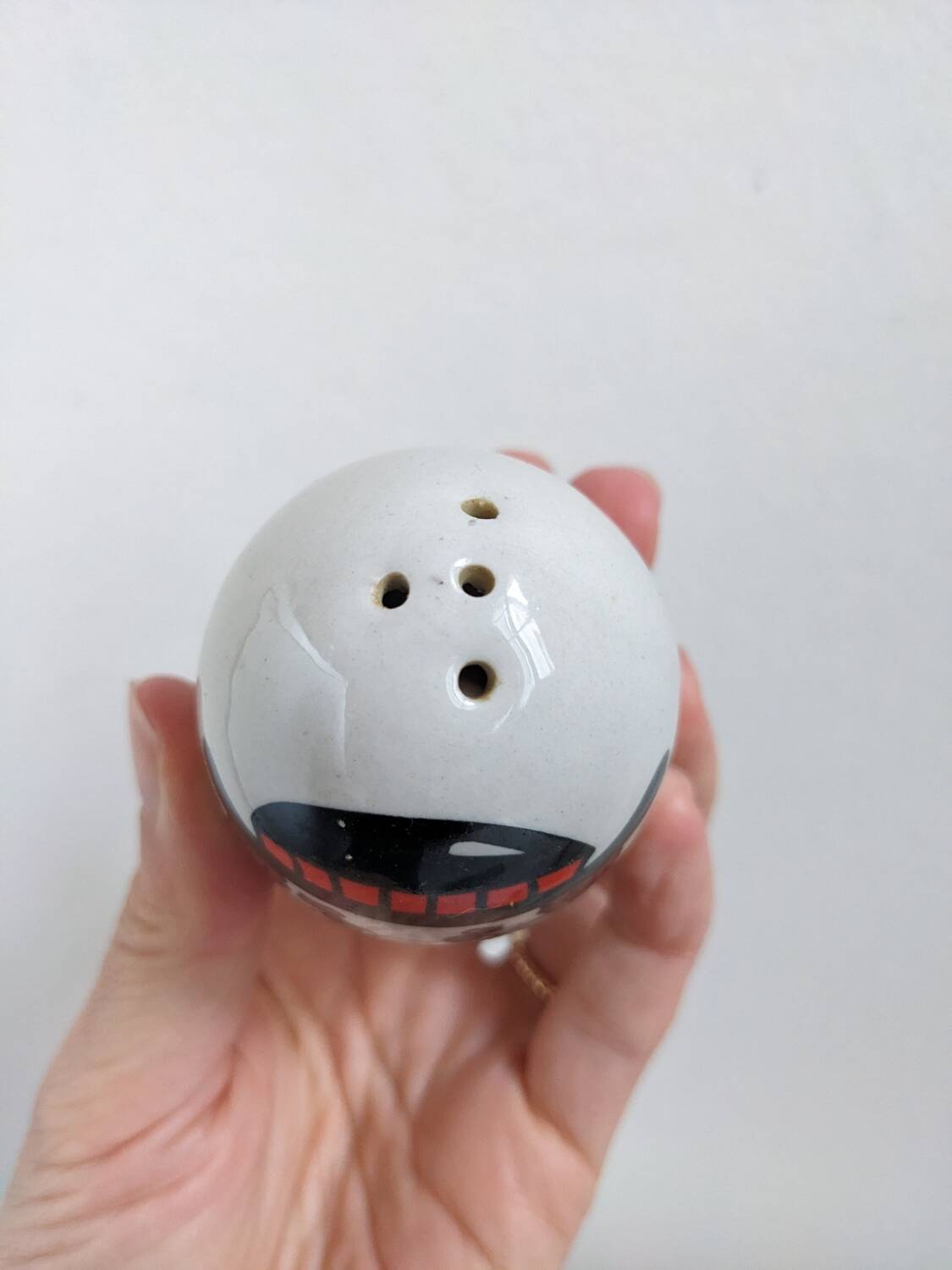 Egg cup, salt and pepper shaker duo