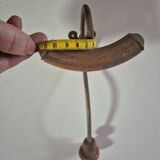 Vintage 1960s wall coat rack in wood and metal.