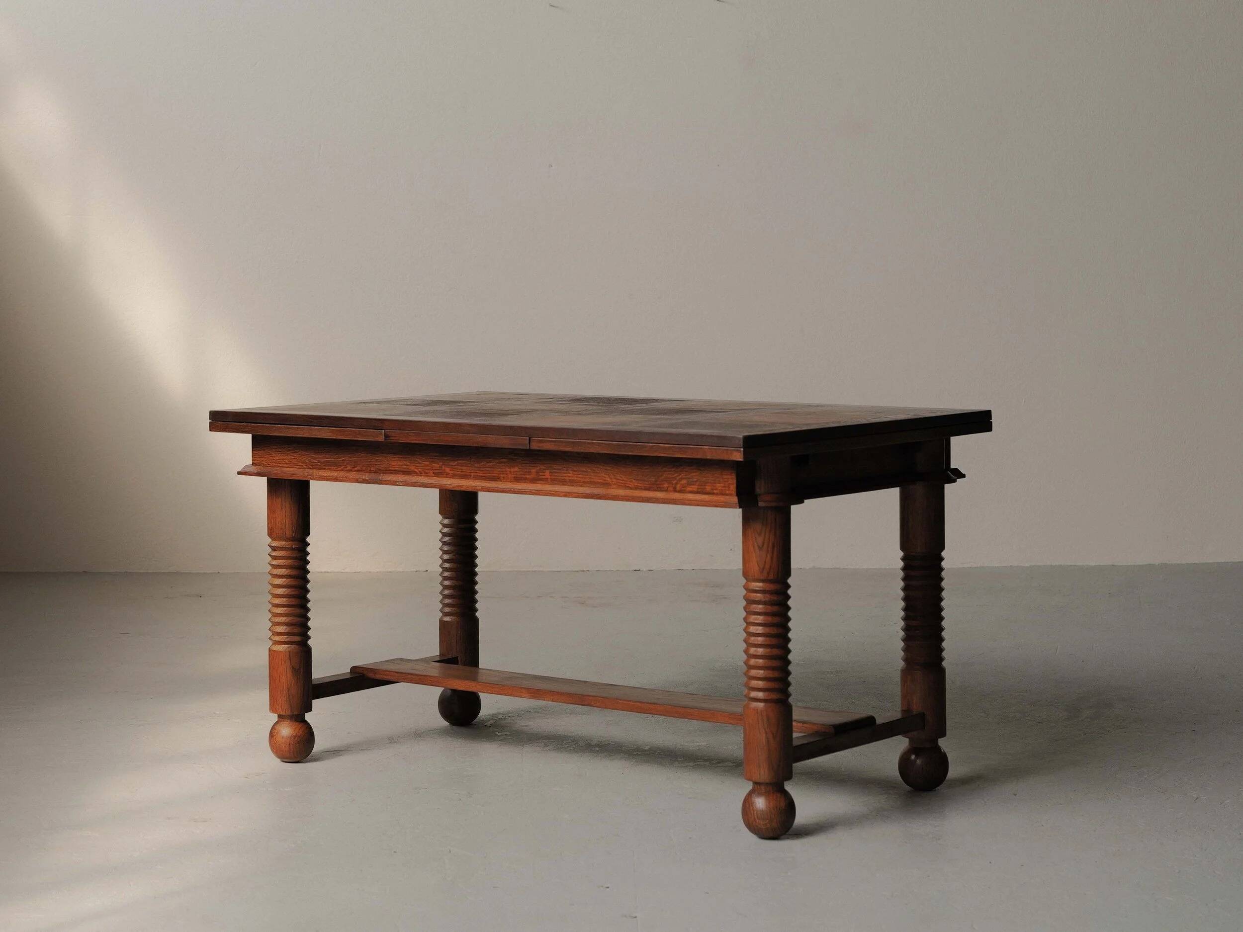 Modernist oak dining table, France, 1940–1950