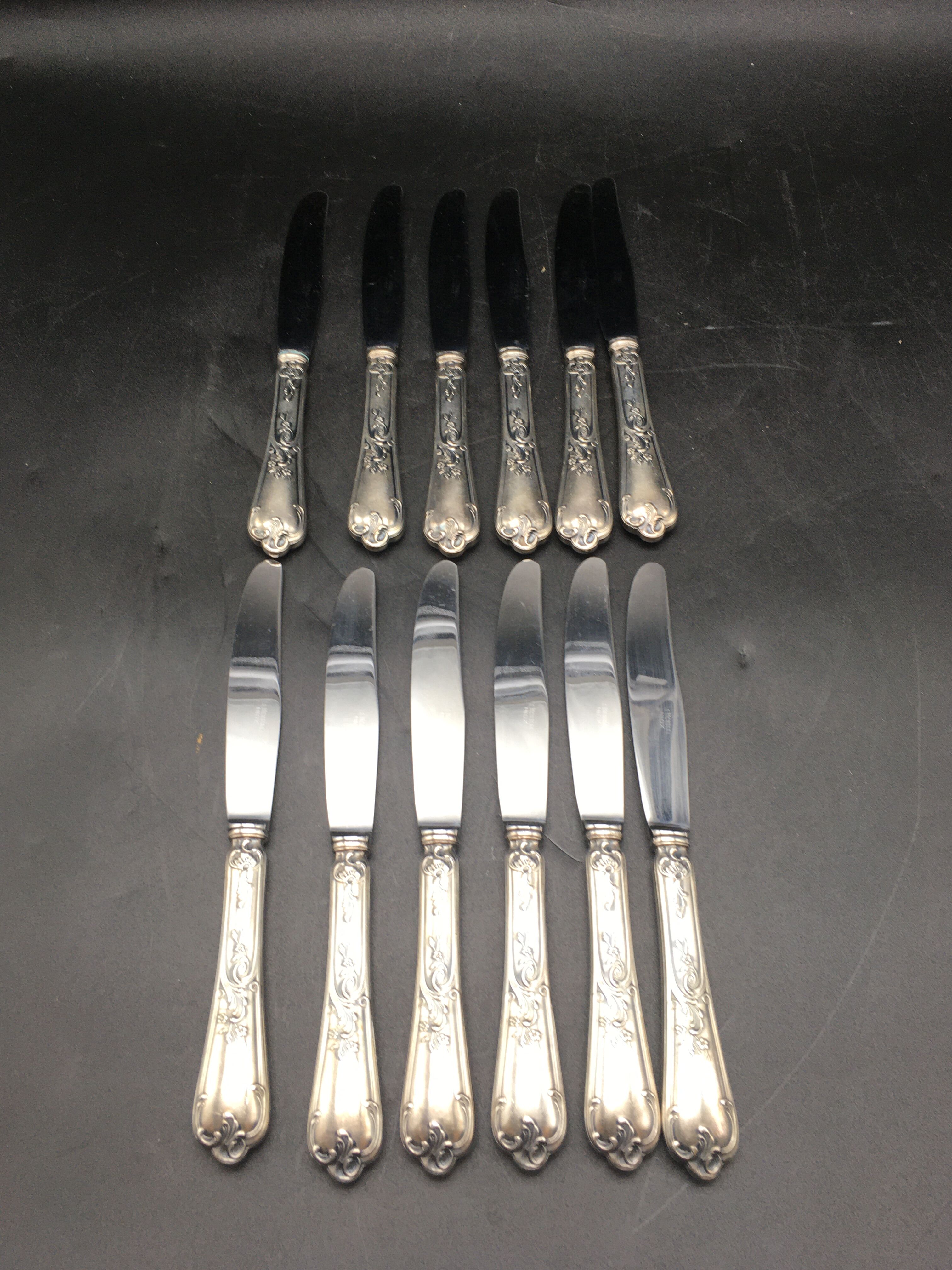 12 silver metal table knives model Rocaille
