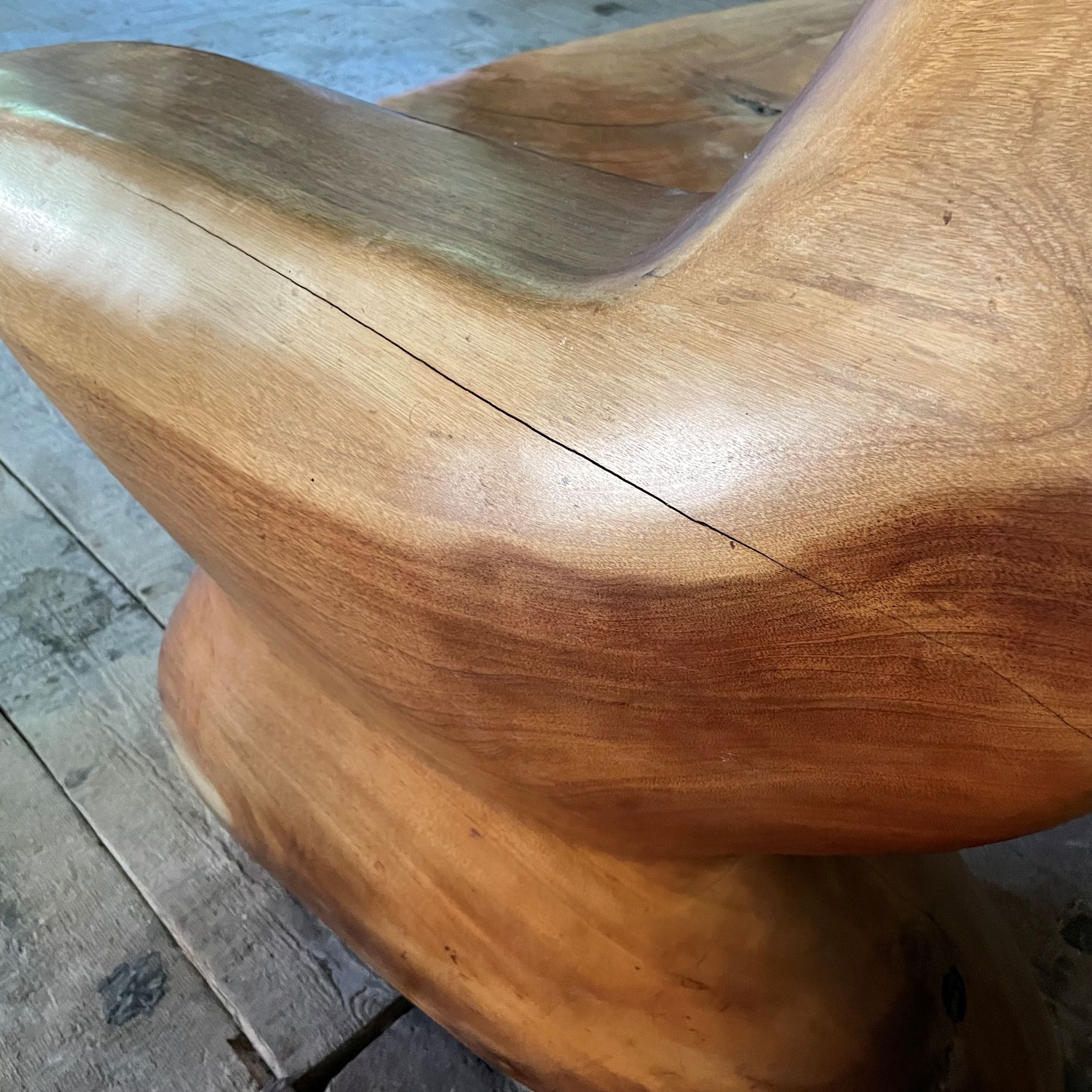 Sculptural solid wooden bench