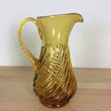Twisted amber glass pitcher