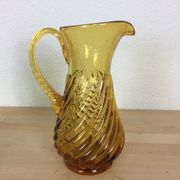 Twisted amber glass pitcher