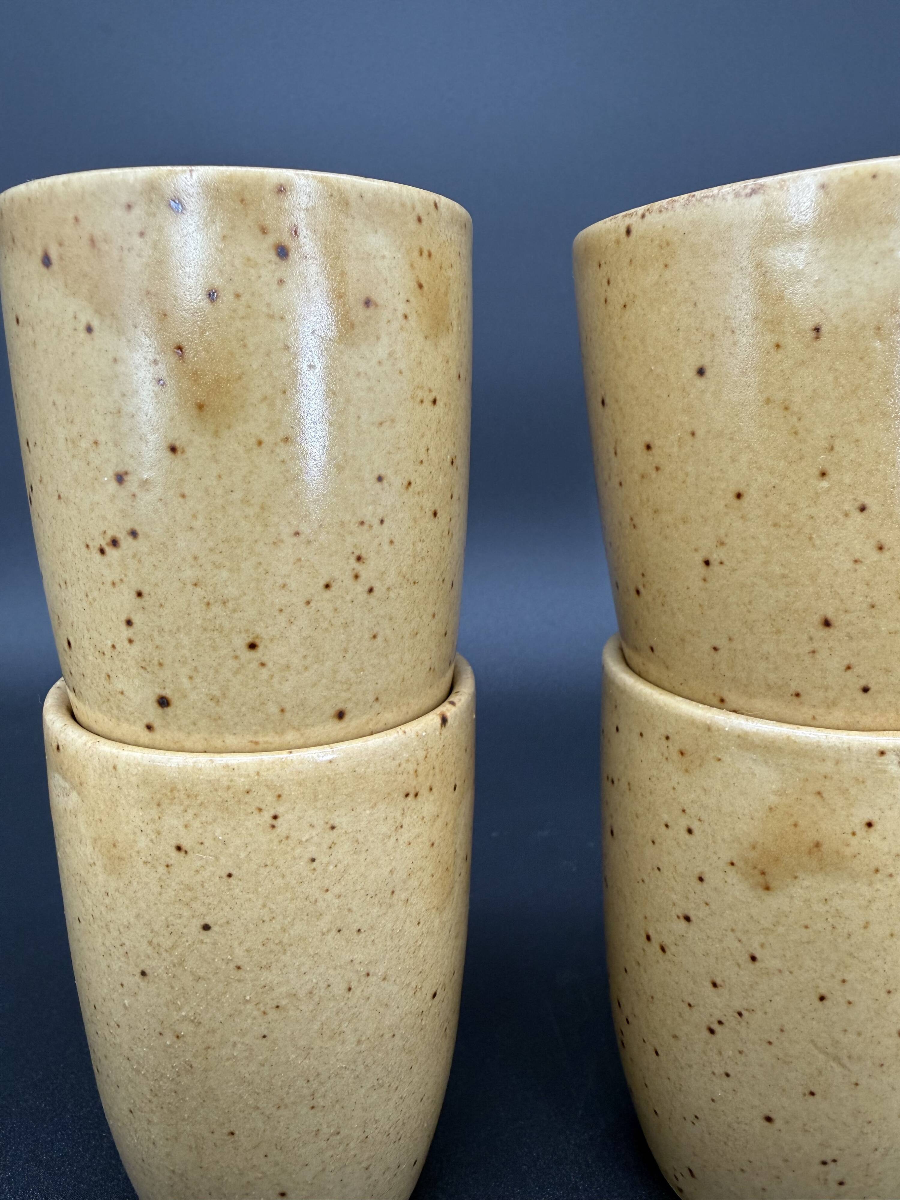 10 glazed stoneware cups signed Digoin