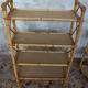Pair of rattan shelves including a corner shelf