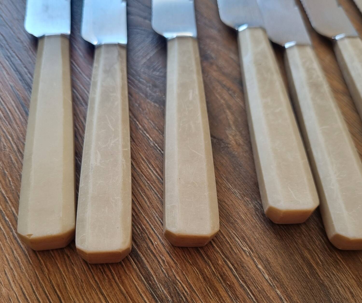 9 knives with bakelite handles, stainless steel, 1950
