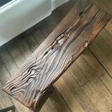 Brutalist burnt wood bench