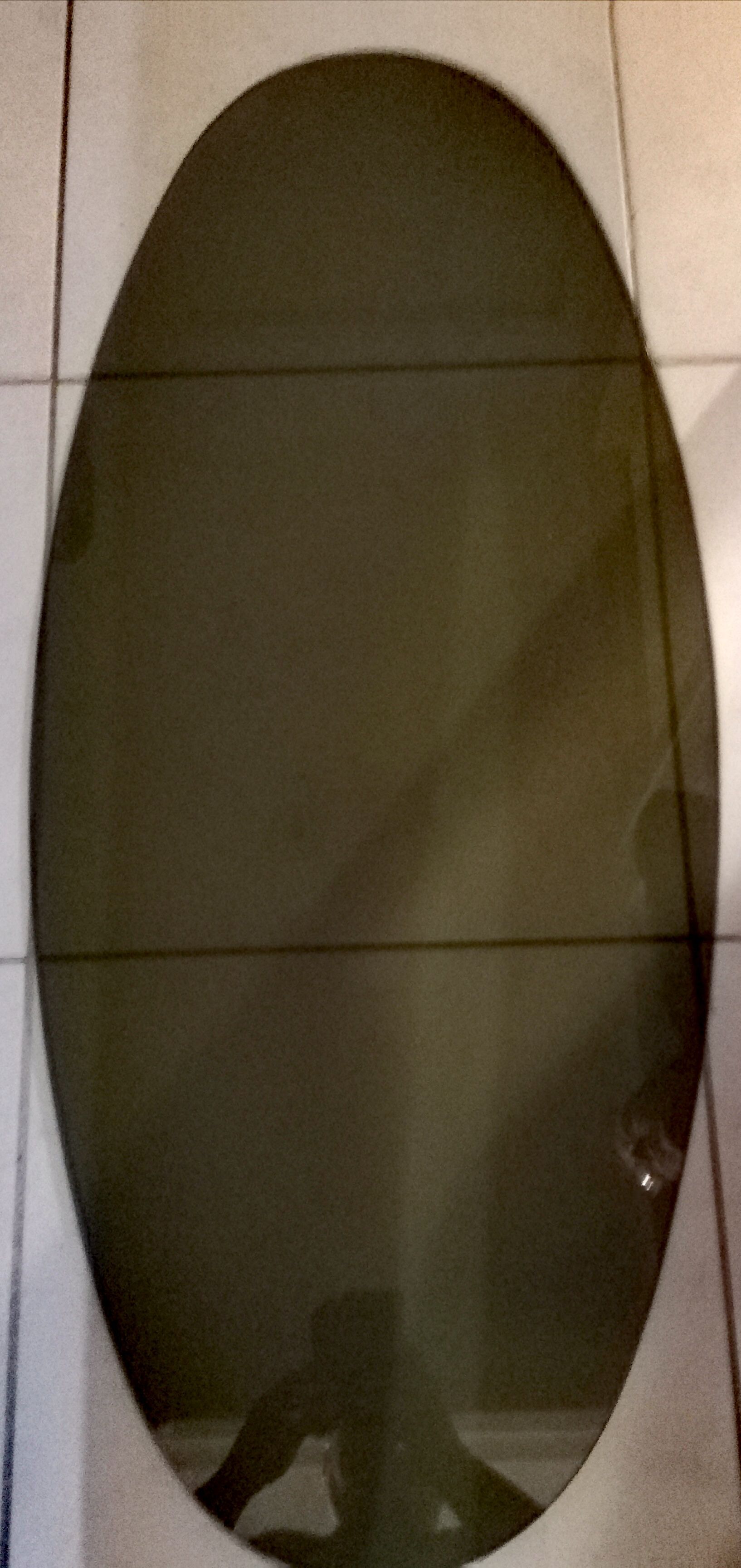 70s oval glass and chrome coffee table