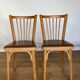Four chairs Baumann 1960 with bars seated skaï brown label