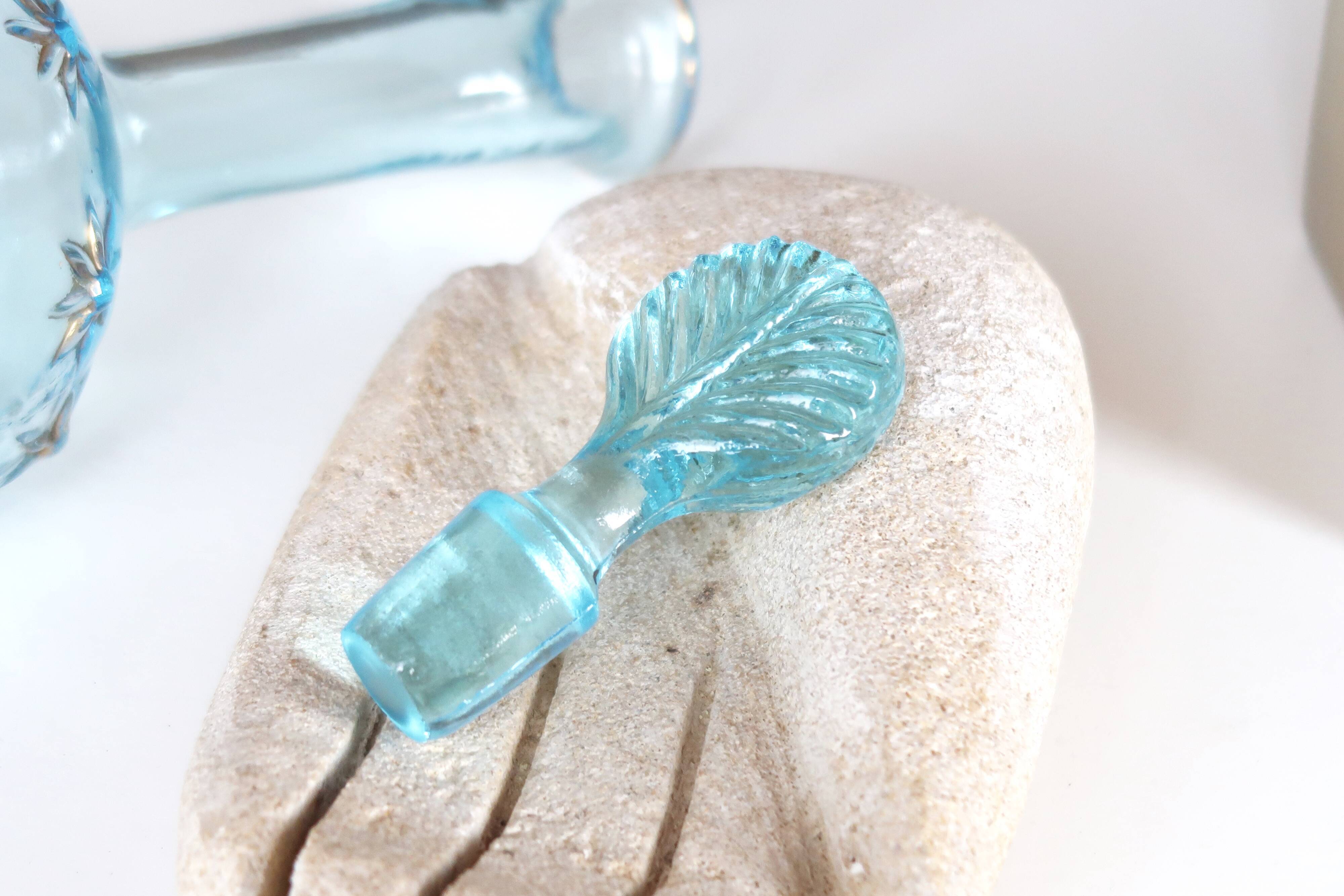 Turquoise blue glass decanter, golden décor, 5O years