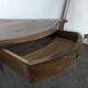 Louis XV corner table in walnut with curved legs.