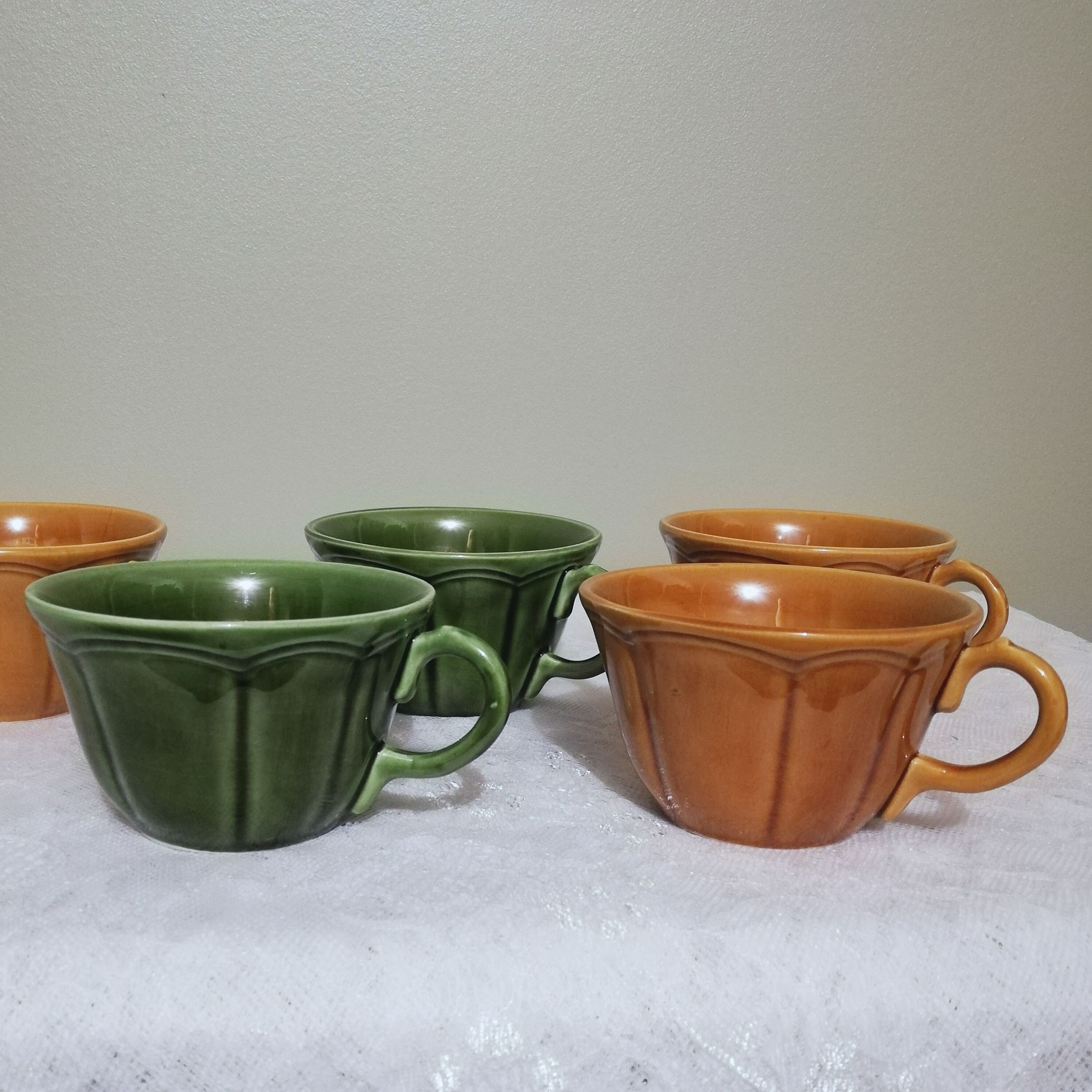 5 coffee or tea cups signed Longchamp