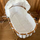 Bamboo, rattan, wicker cradle bassinet from the 1960s with a foldable support.