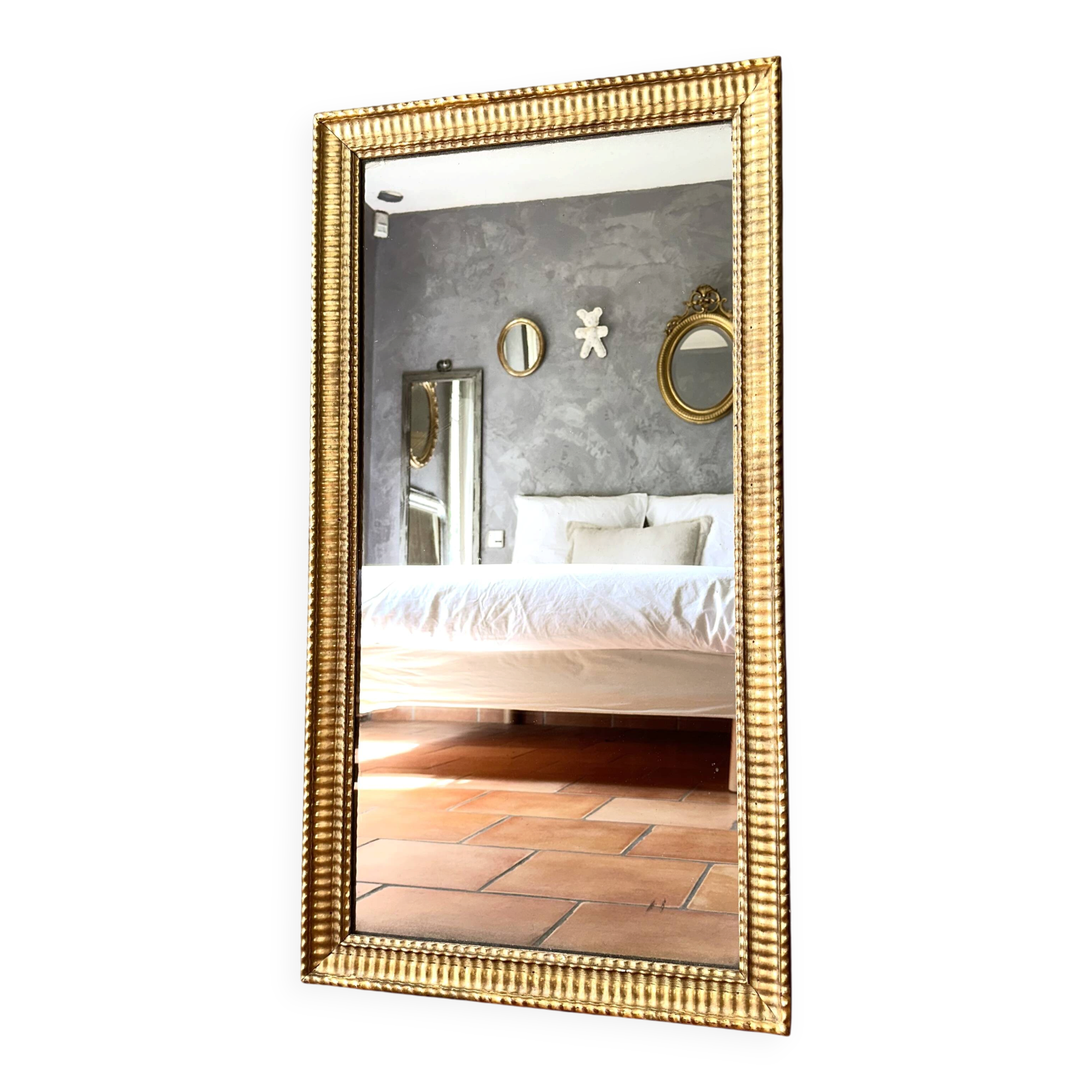 Antique Napoleon III gilded mirror from the 19th century.
