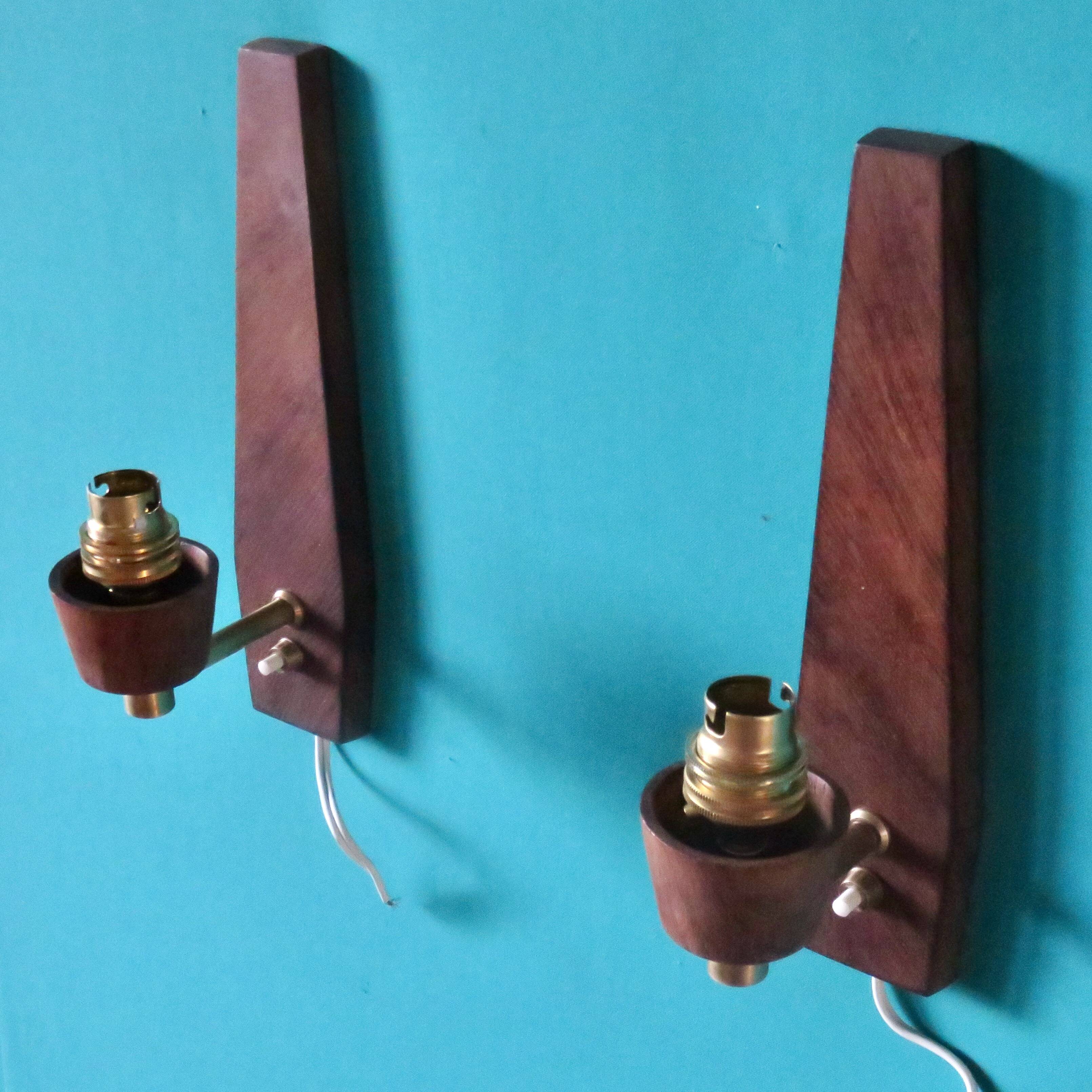 Pair of "Vitrika" rosewood wall sconces with turquoise shades. Denmark, 1960