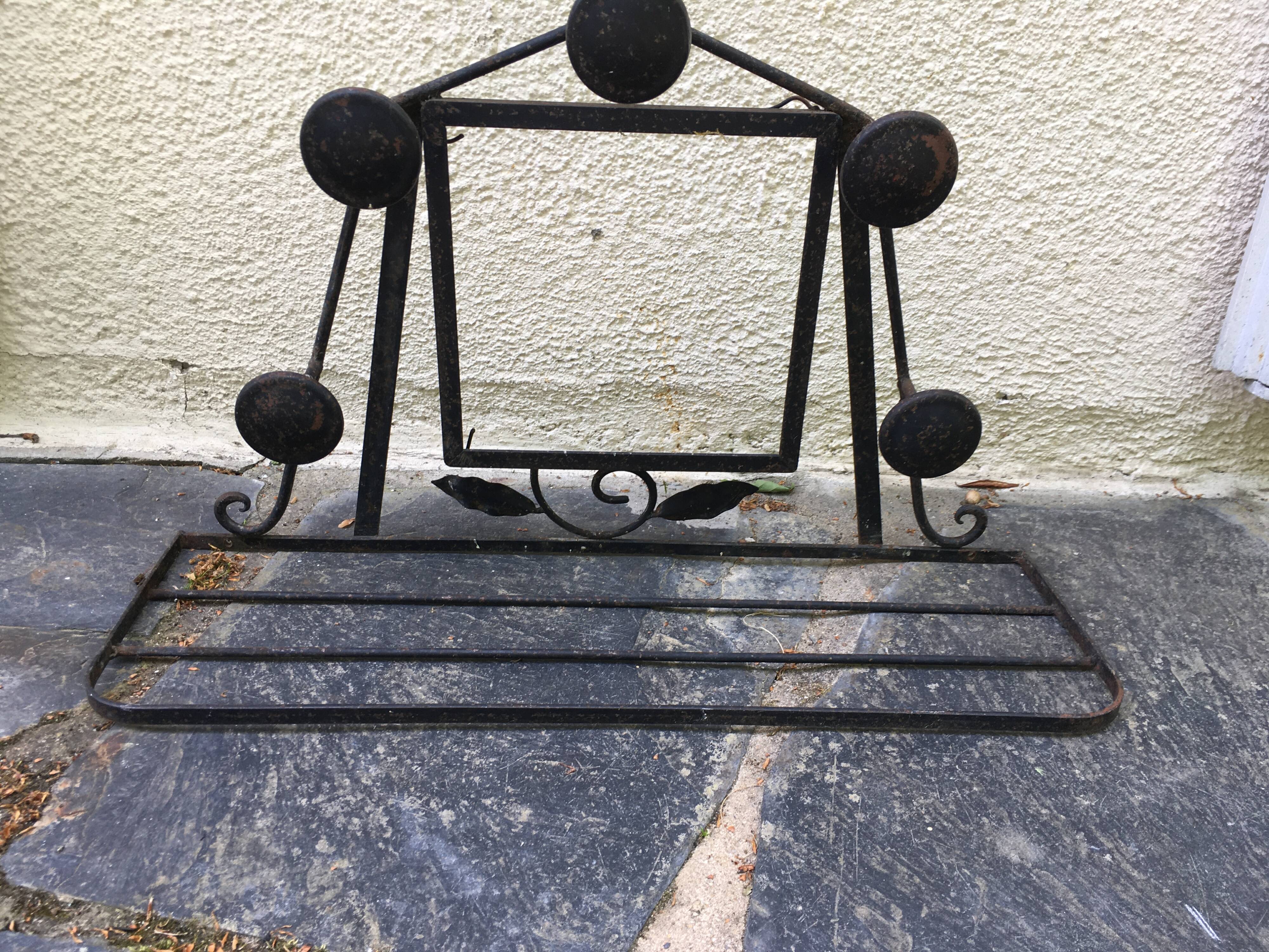 Wrought iron coat rack.