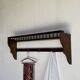 Antique wooden wall shelf with a turned gallery and 5 hooks L120 H40 D18