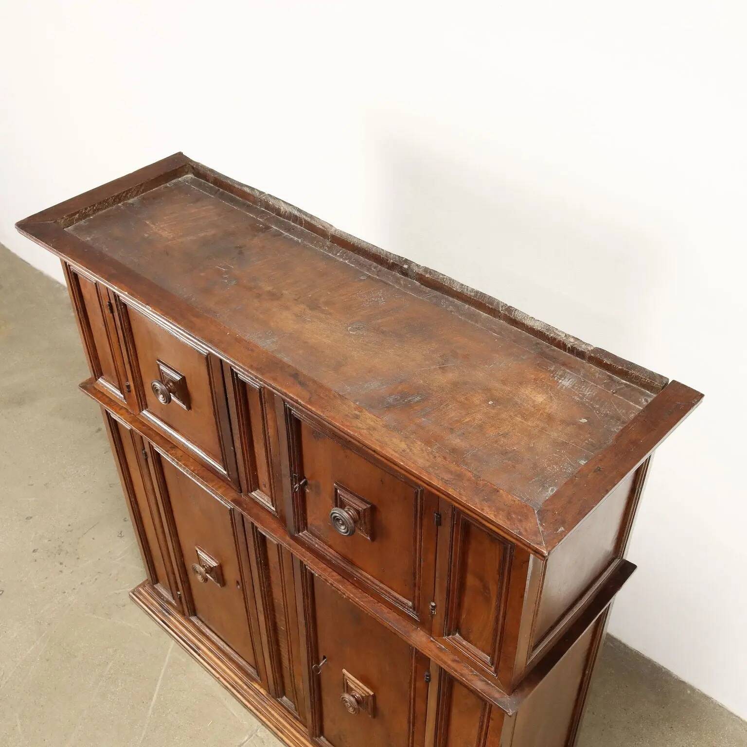 Antique double-bodied buffet, early 17th century, walnut doors.
