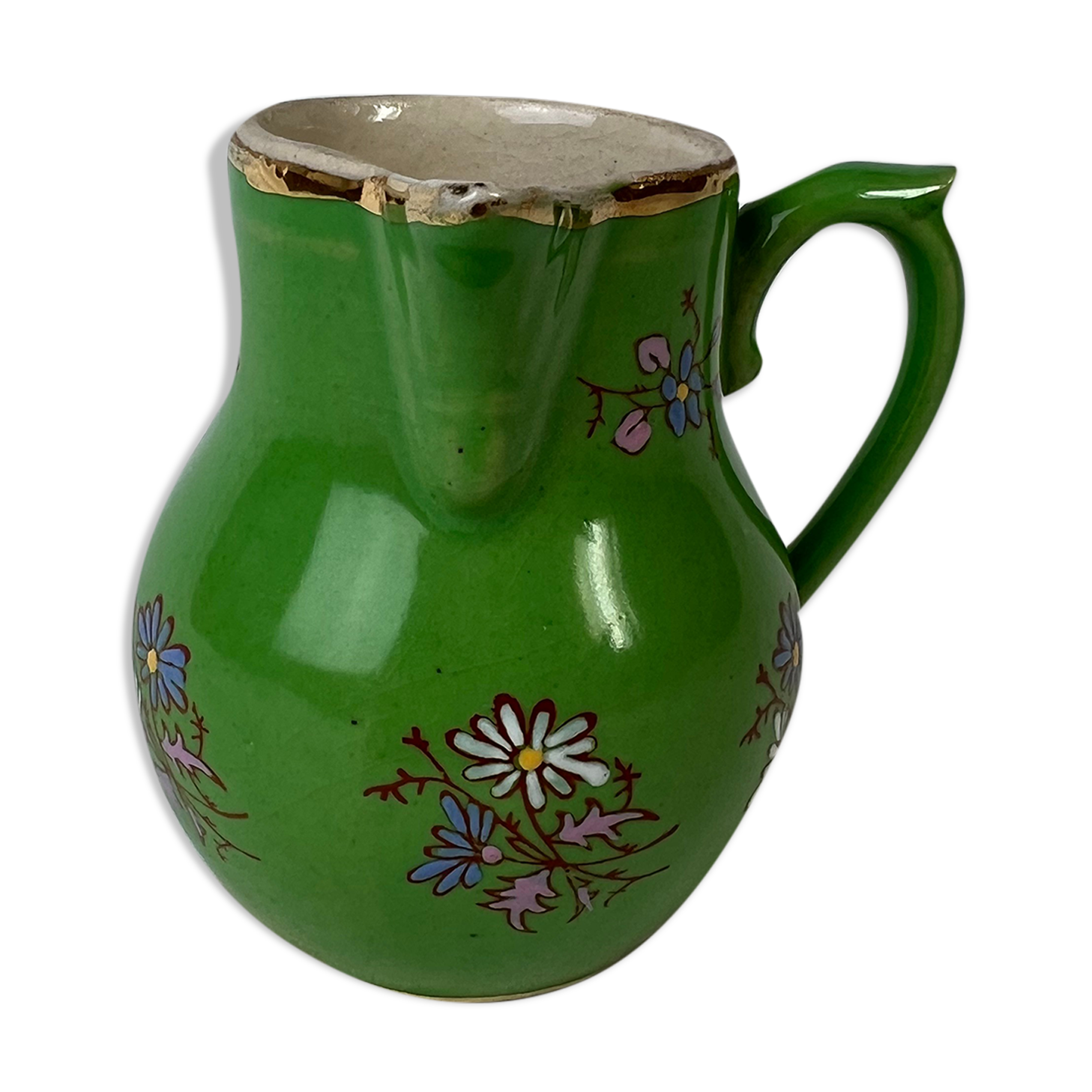 Green milk jug with enamelled flowers