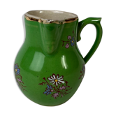 Green milk jug with enamelled flowers