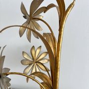Vintage Hollywood Regency gold metal leaf wall sconce.