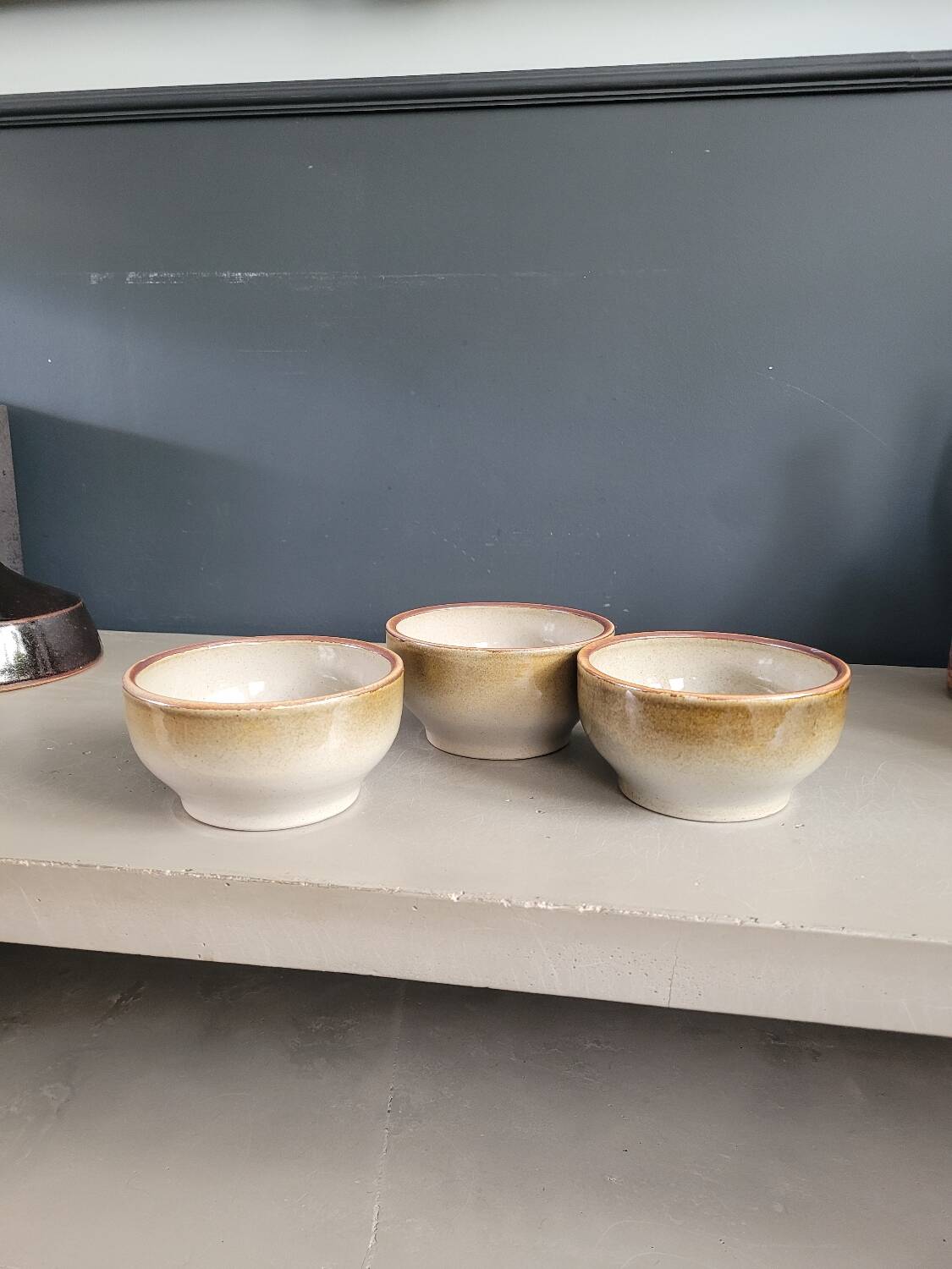 Trio of vintage stoneware bowls
