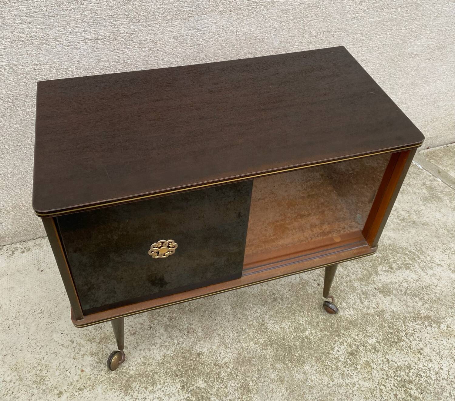 Vintage display bar cabinet on wheels from the 60s/70s.