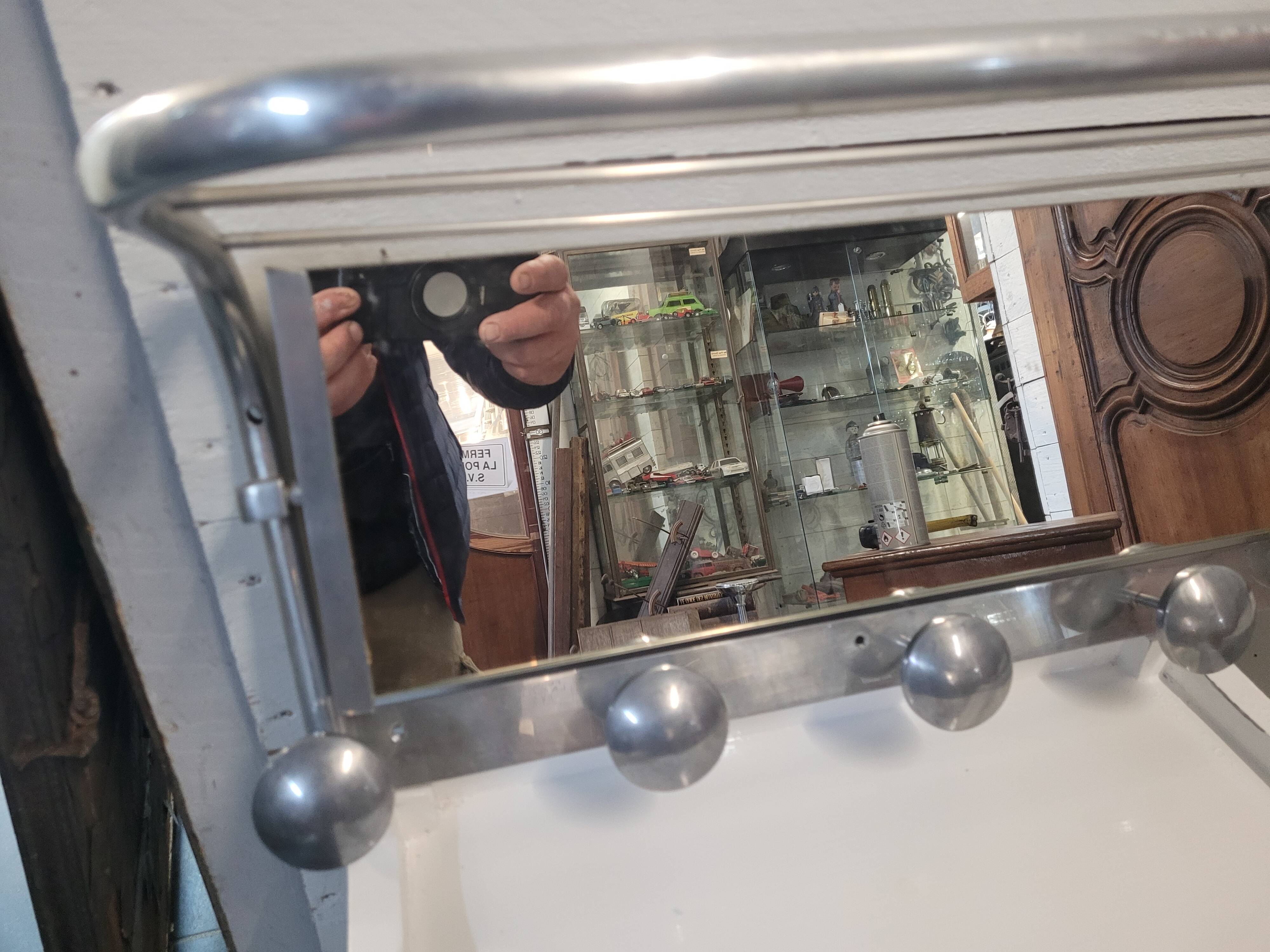 Aluminum wall coat rack with pivoting mirror from the 60s