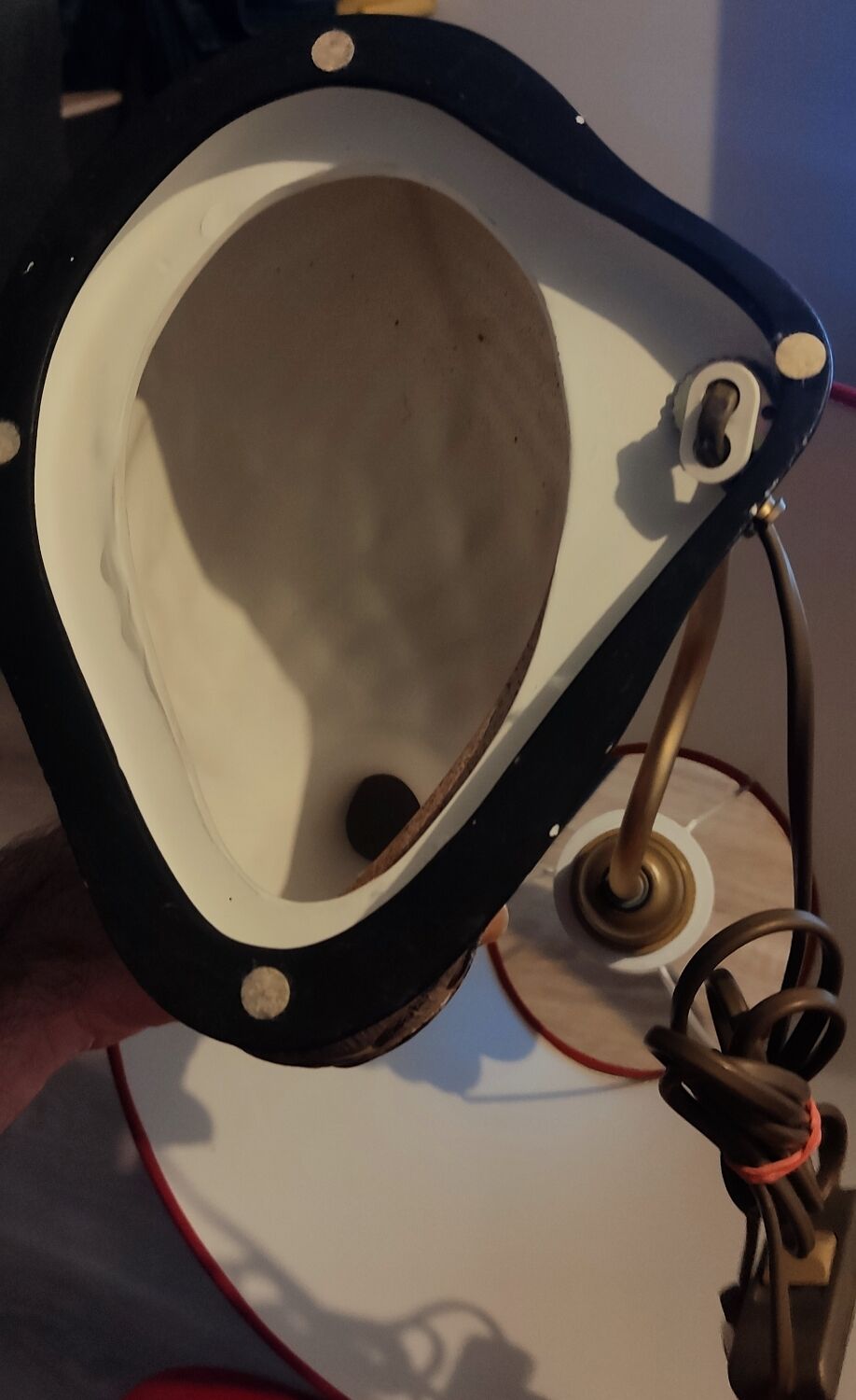 Decorative table lamp with a sculpted duck-shaped base and painted finish.