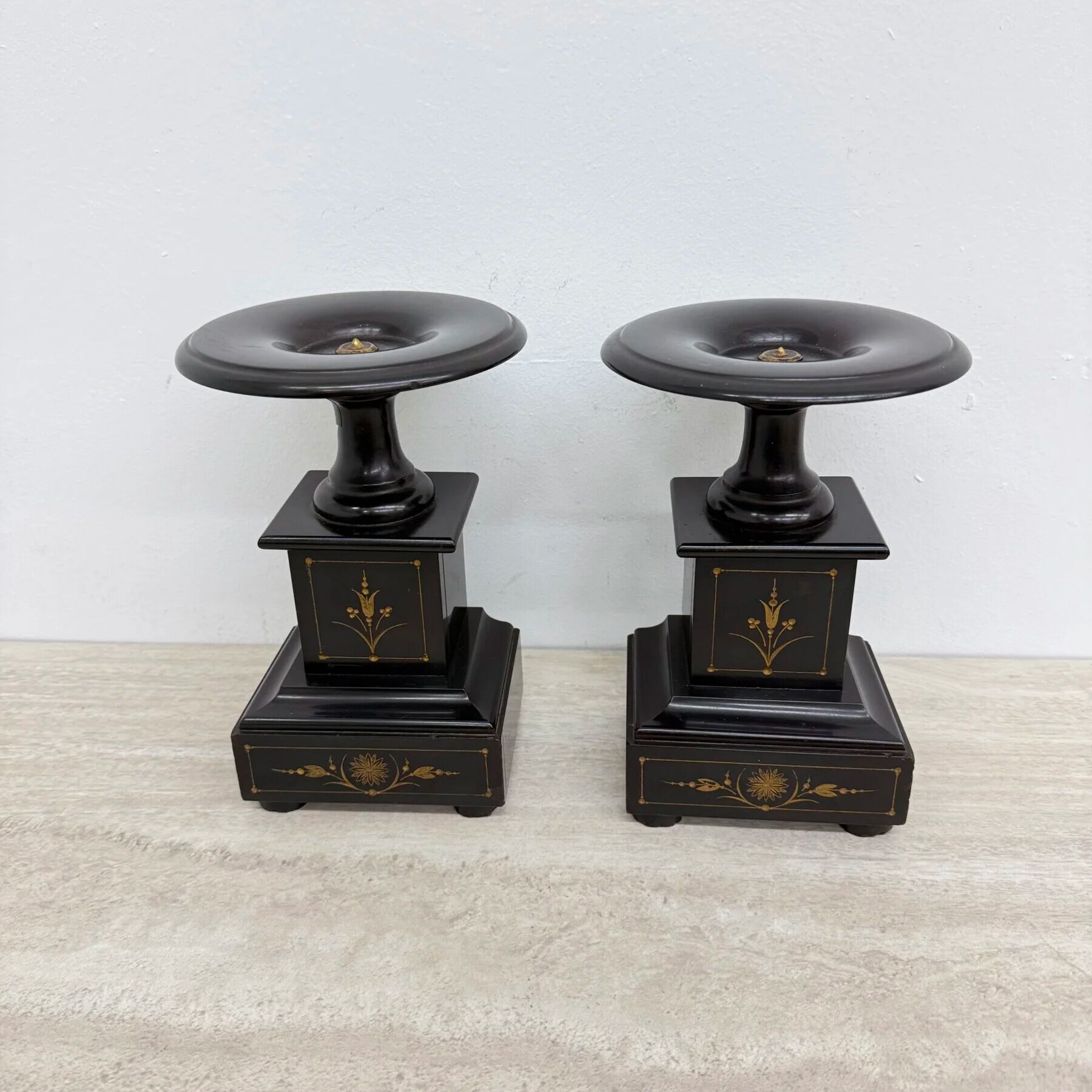 Antique French black marble cassoulets gilt decor pedestals neoclassical pair, 1900s