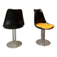 Set of black and yellow tulip chairs