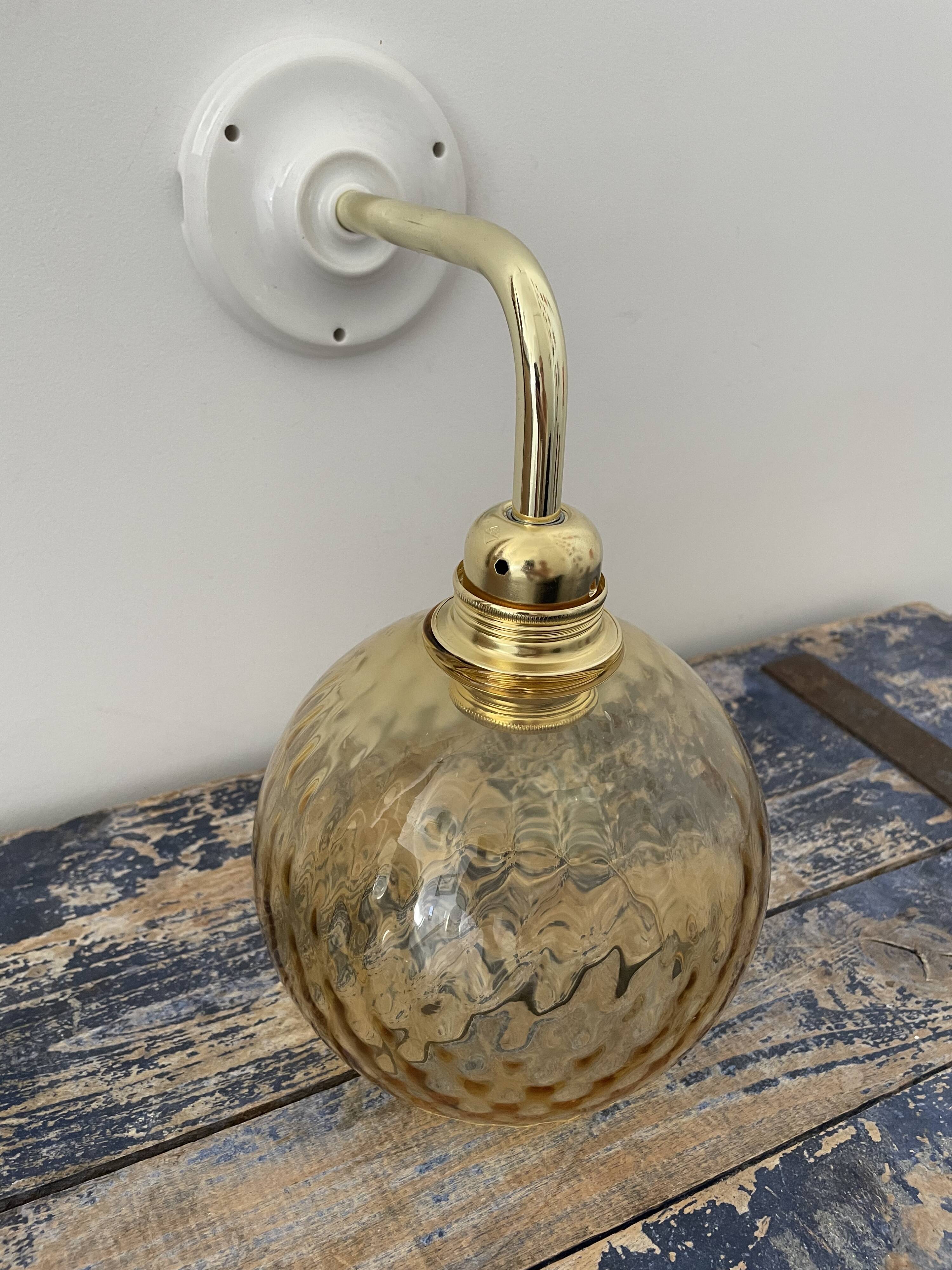 New electrified golden globe wall lamp