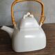 White vintage teapot