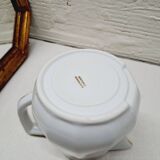 White and gold porcelain pitcher