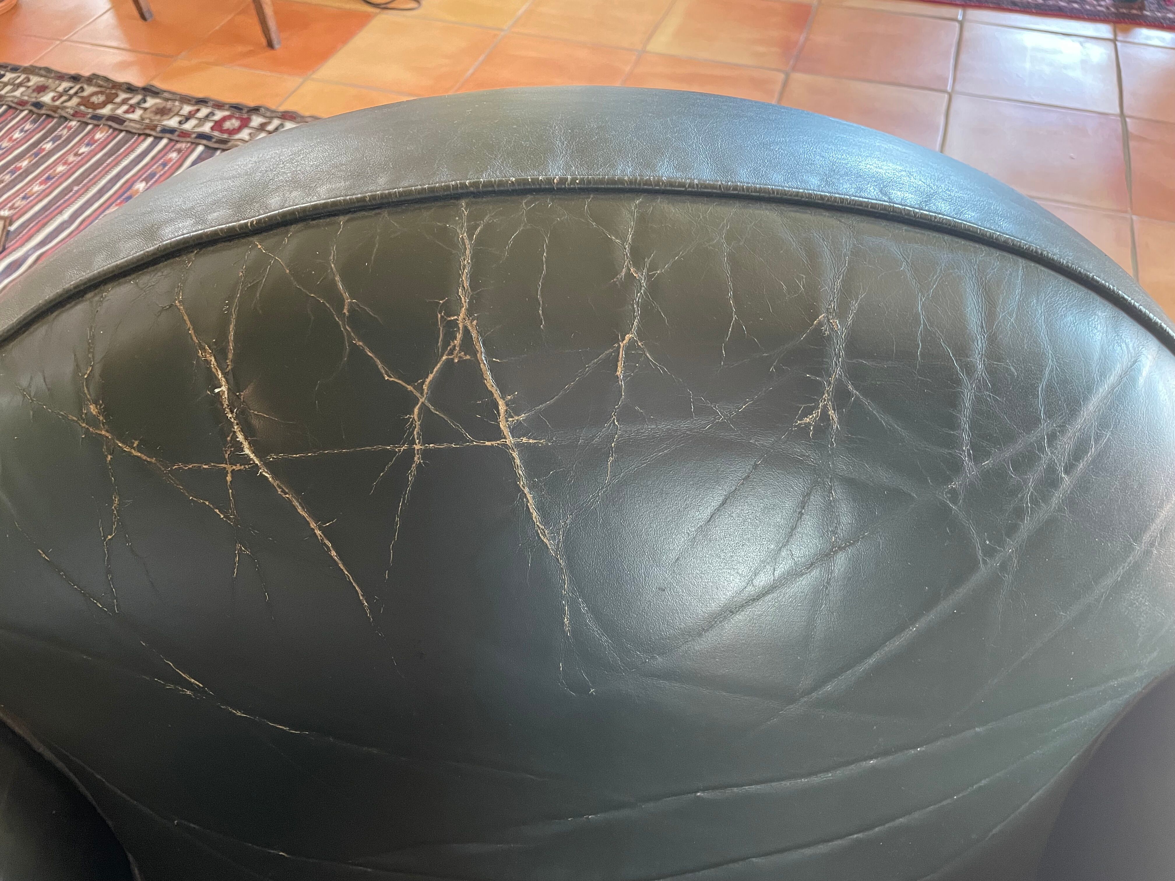 Green leather club chairs