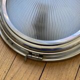 Thick glass ceiling light fixture with a chrome metal support, Holophane type.