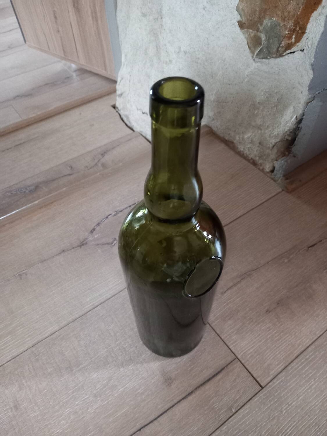 Old thick glass bottle