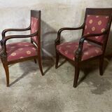 Pair of empire-style armchairs with dolphins