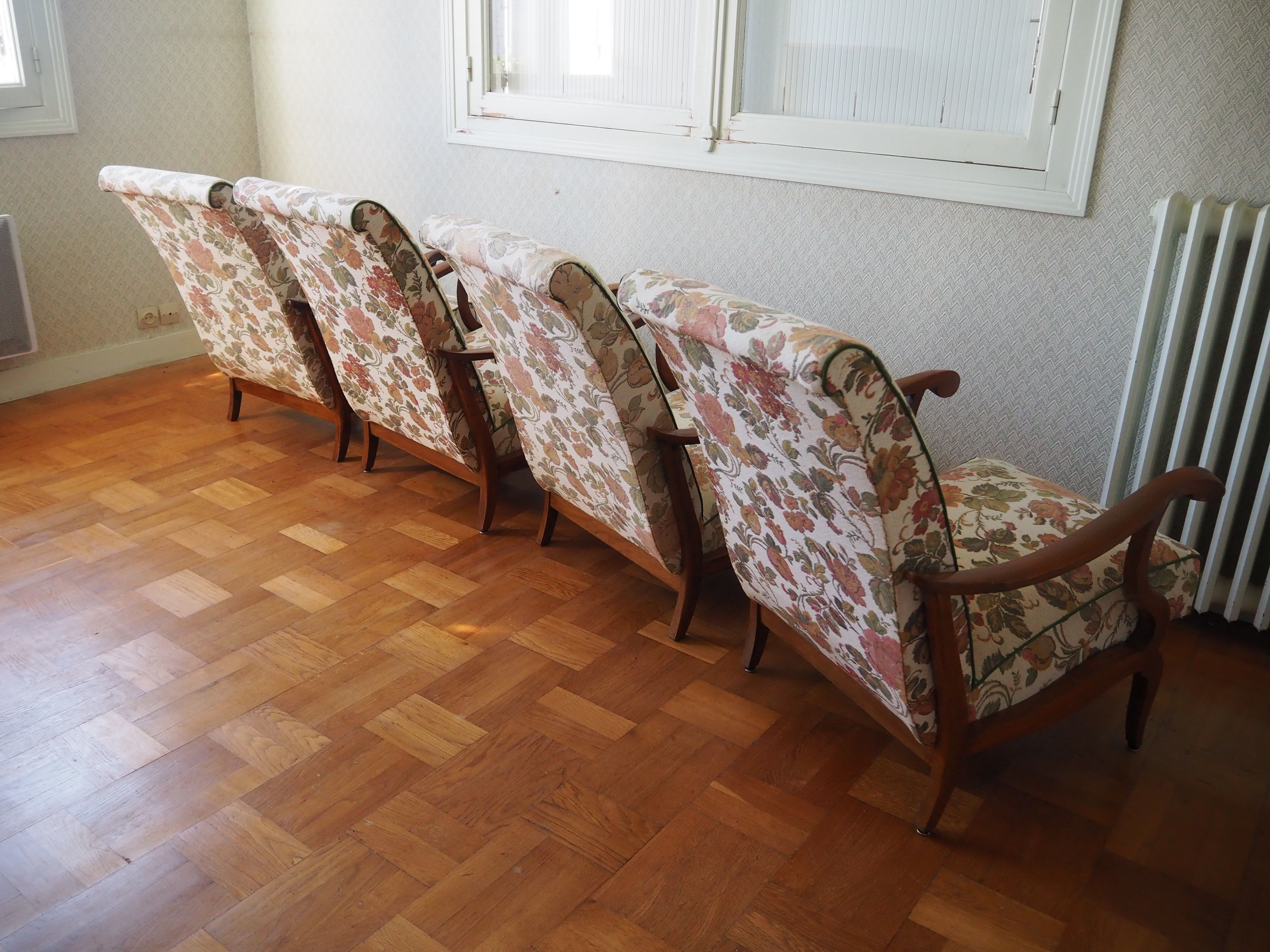 Four 1950s armchairs - wooden armrests