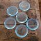 6 molded glass plates – 5 bluish, 1 aqua green