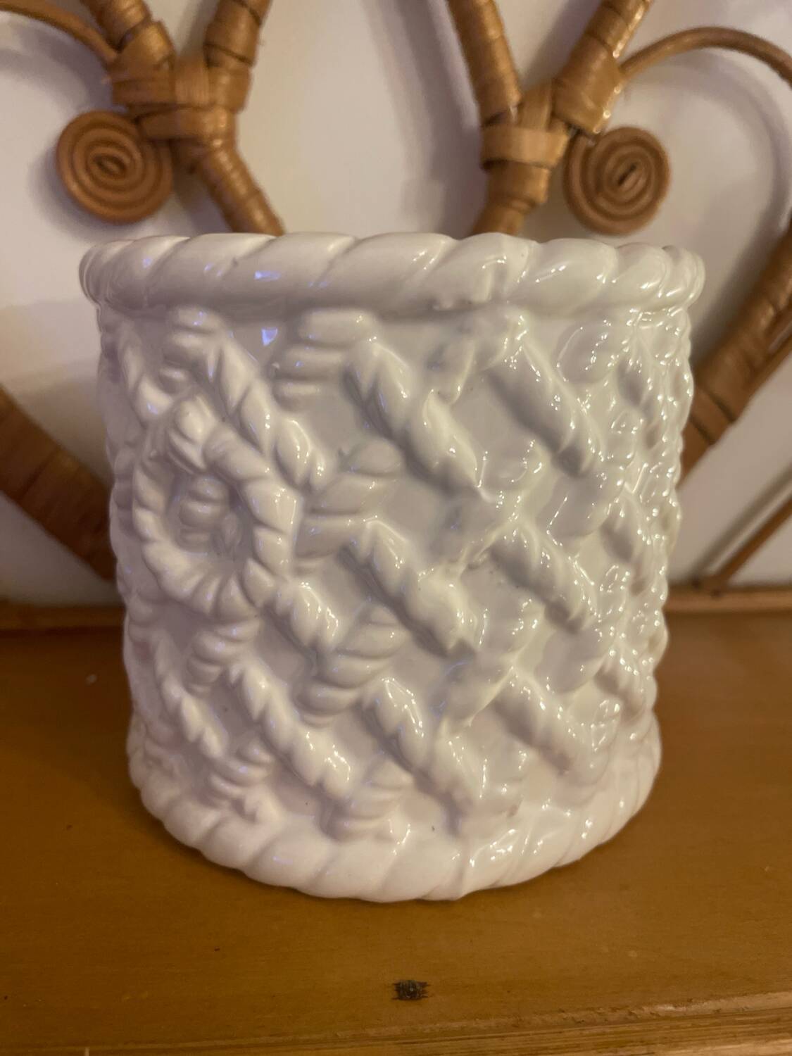 White woven earthenware flowerpot