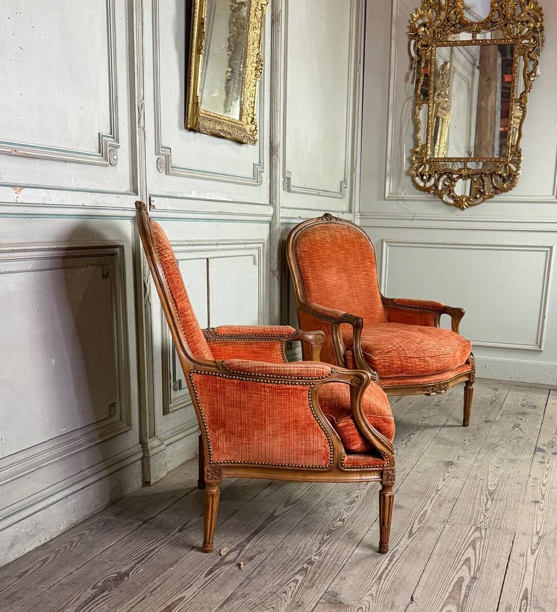 Pair of transitional carved wooden armchairs, 18th century