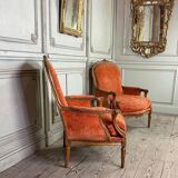 Pair of transitional carved wooden armchairs, 18th century