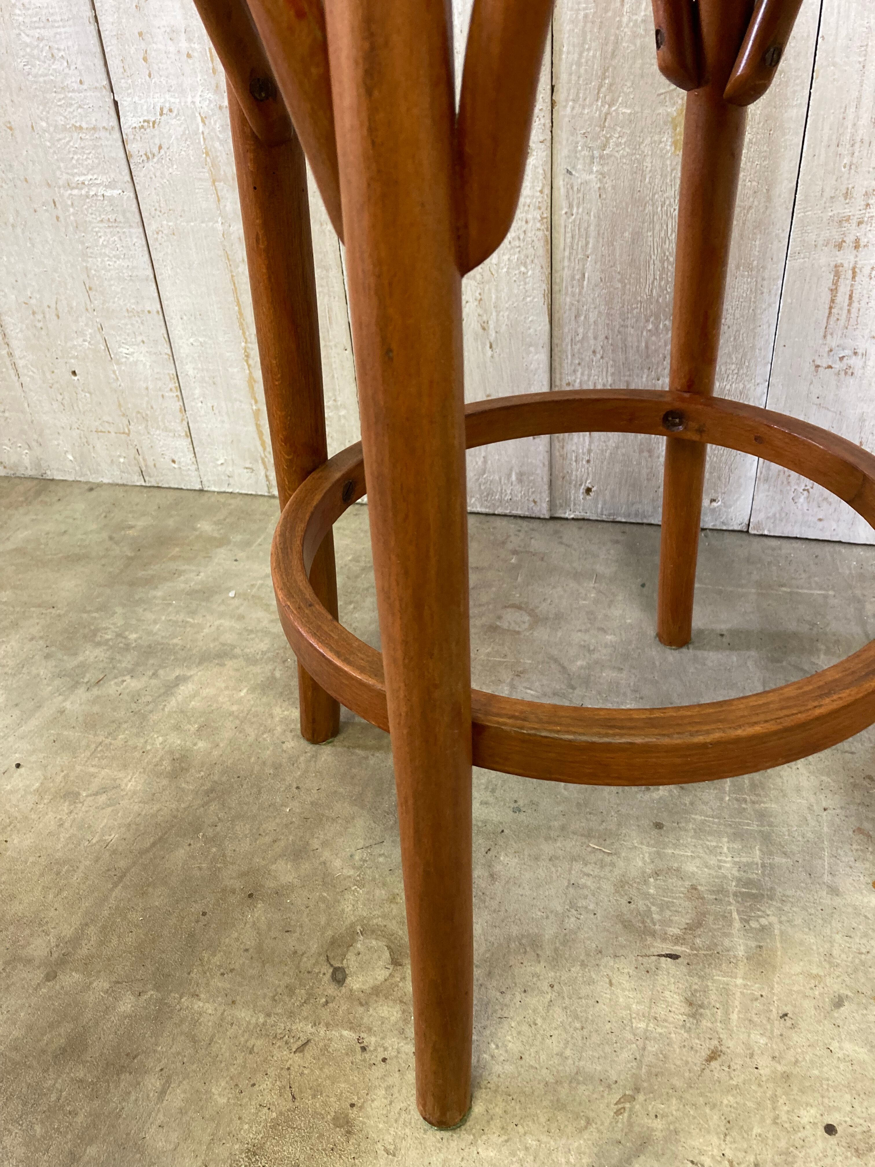 Curved wooden stool