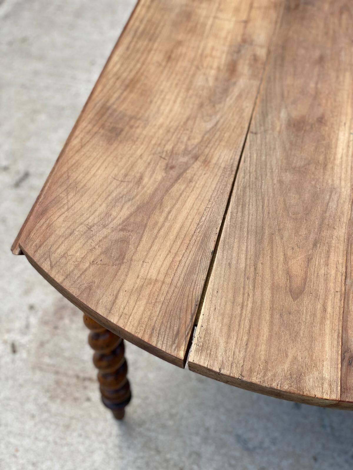 Louis Philippe oval table with shutters, 19th century, solid oak wood, twisted leg