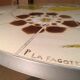 Round vintage coffee table with ceramic tray - 70s