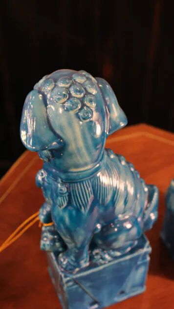 Pair of Foo dog bookends in turquoise glazed ceramic, Manises